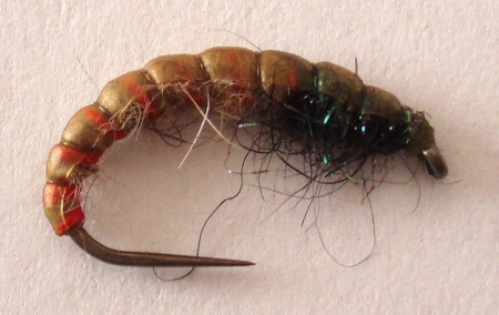 š.1205 hnědý blešoun